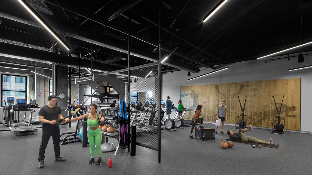 A group of people in a gym.